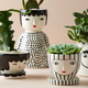 Illustration for article titled Someone Please Tell Me To Stop Buying Planters With Faces On Them